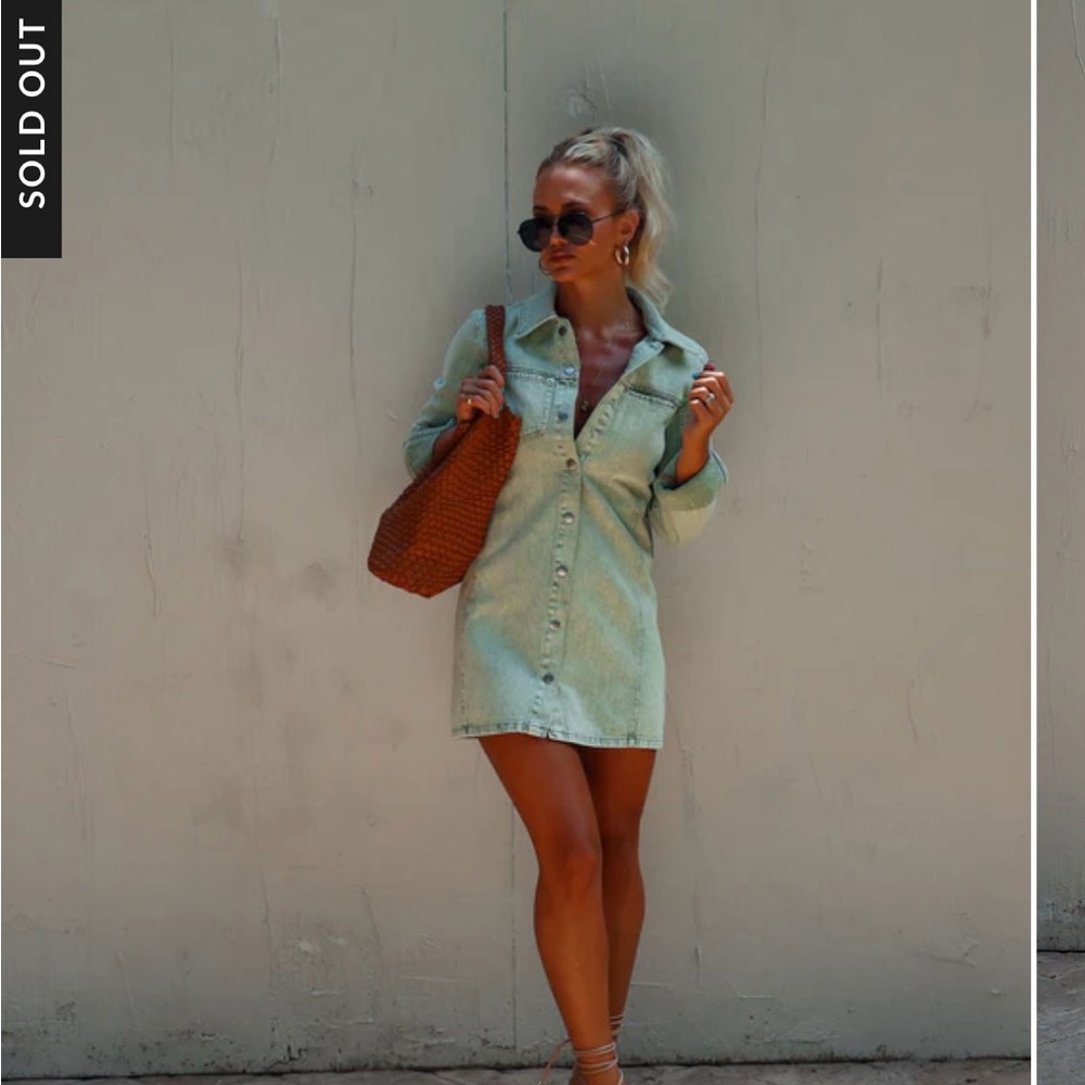 Selling a new with tags, denim dress size large